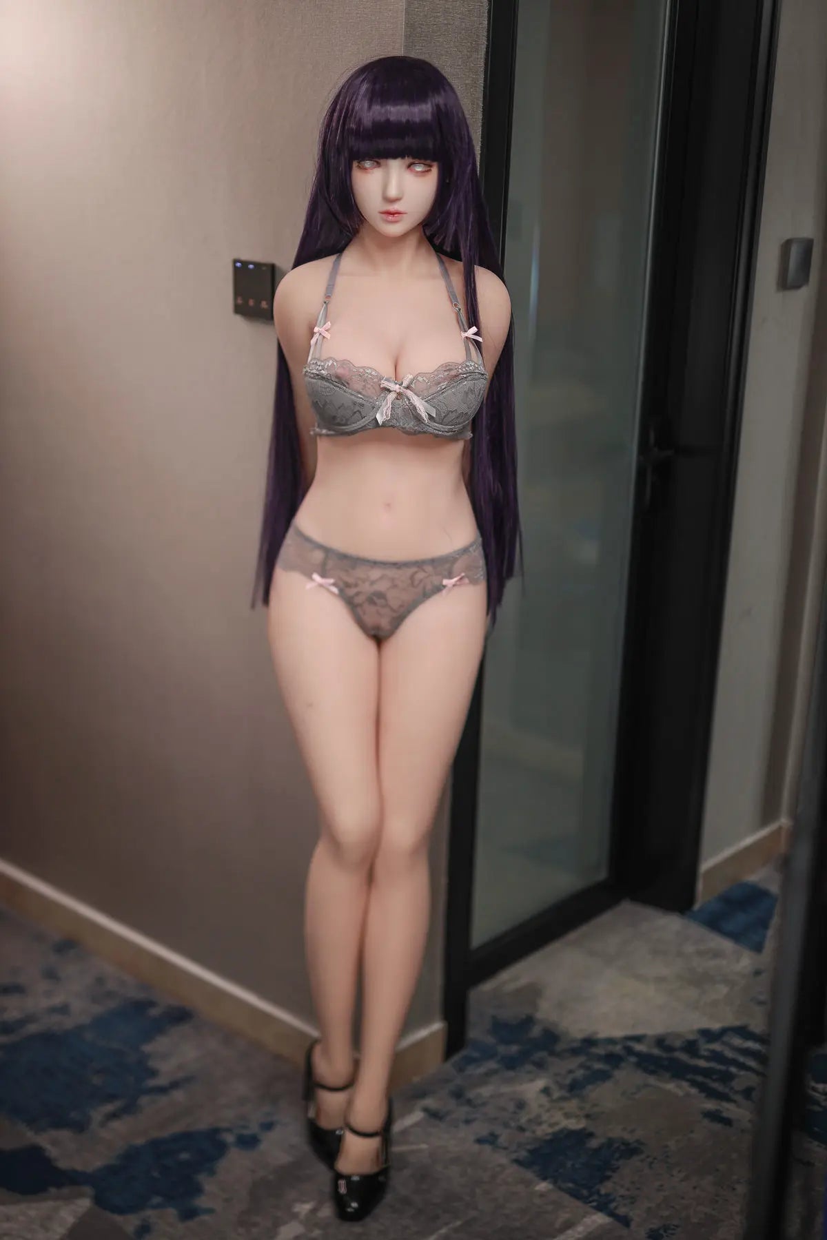 Hinata, Naruto cosplay sex doll,  black straight hair, grey lingerie set, full body shot, black heels, pearl earring, standing at a wall edge, revealing her bra and beautiful curves – anime cosplay sex doll by TopLoveDoll
