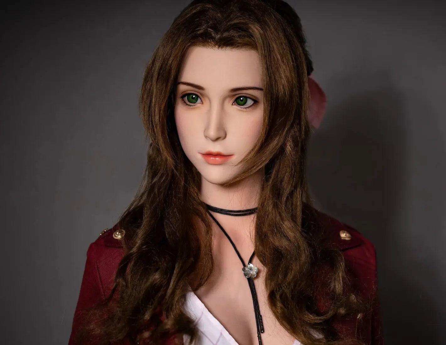 Hera, iconic green eyes, dark brown long curls hair, dark red suede jacket, white V-neck slip dress, pink bow, black choker, grey studio lighting background, chest-level shot, front view– European bookish bombshell companion sex doll by TopLovedoll