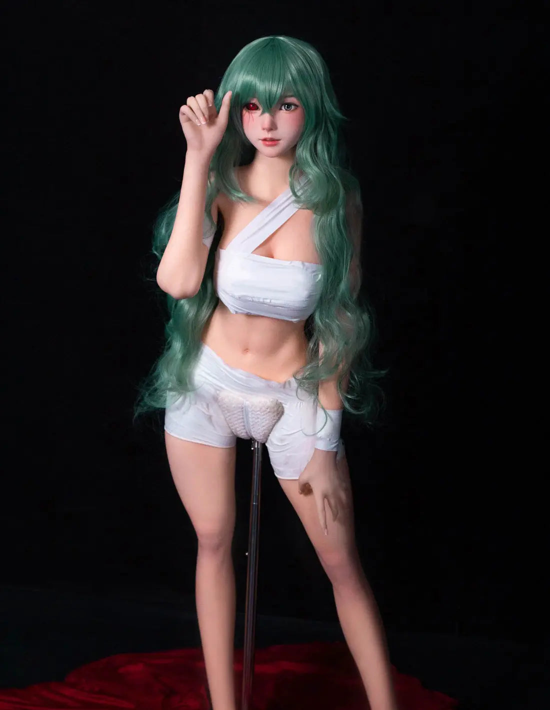Alayah, green long wavy hair, white crop top, white shorts, dark studio lighting, Takatsuki Sen Eto Tokyo Ghoul, half-human half-ghoul, standing on a red carpet, with a steel doll stand held between the thighs – anime cosplay fantasy sex doll by TopLoveDoll