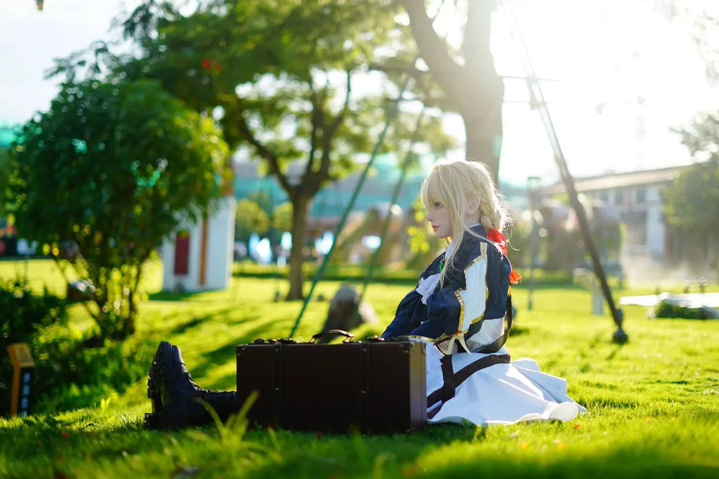 Aliana, golden straight long hair, blue eyes, navy Auto Memory Doll uniform, white apron, black leather boots, outdoor, sitting in the sun and on the grass, brown gloves, holding a brown leather suitcase, eye-level shot, side view, look away, doing the salute gesture, horizontal profile – Violet Evergarden cosplay anime sex doll by TopLoveDoll