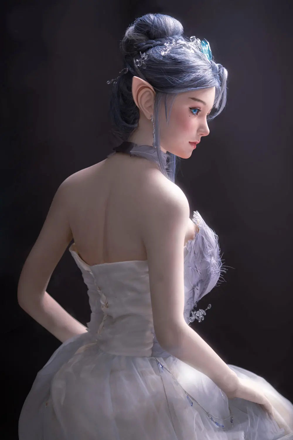 Alisha silver-blue hair, porcelain skin, pointed ears, floral tulle and feather gown, fantasy pose, three-quarter shot, standing, 45-degree back view– lavender elf fantasy sex doll by TopLoveDoll