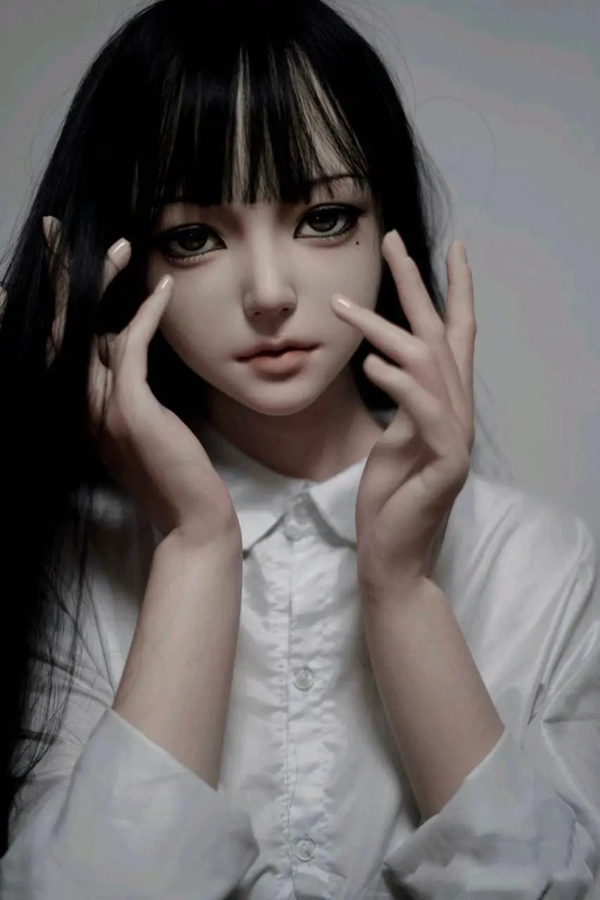 Alana, black straight long hair, white shirt black JK pinafore dress, crimson bow, white mask, scars on the face, white studio shooting scenario, a tear mold under the left eye – Tomie Junji Ito inspired horror beauty anime sex doll by TopLoveDoll