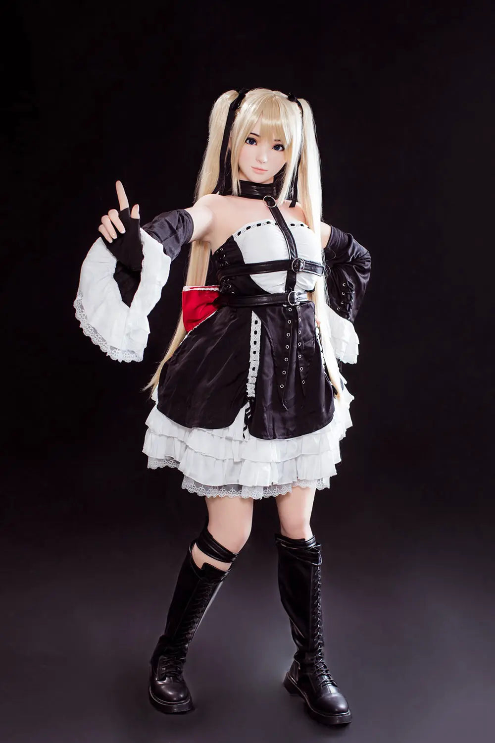 Alison blonde twin tails, black and white maid outfit, cosplay pose, dark background, standing and pointing her fingers up, slightly further profile view – Marie Rose cosplay sex doll by TopLoveDoll