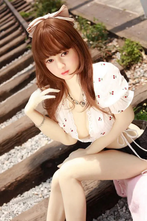 Arya high-maintenance Asian girlfriend sex doll- in cherry crop top and black denim shorts , sitting on the corridor- sweet face impossible energy the one you can't quit by TopLoveDoll