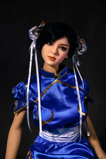 Aubriella Street Fighter Chun-Li cosplay sex doll in blue qipao on a black background - iconic blue qipao fighter fantasy by TopLoveDoll