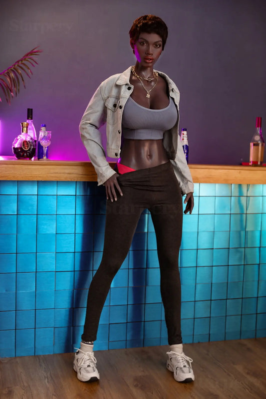 Lupita sex doll cool composed gaze with parted lips, deep dark brown eyes, short cropped dark brown pixie cut, layered gold chain necklace with padlock pendant, light grey denim jacket open over grey scoop-neck crop tank top with full round bust prominently displayed, toned bare midriff, black fitted leggings, white chunky sneakers, slender athletic figure, leaning against blue mosaic tile bar counter with liquor bottles and pink neon light background – full-body shot – lifelike ebony athletic sex doll, TLD