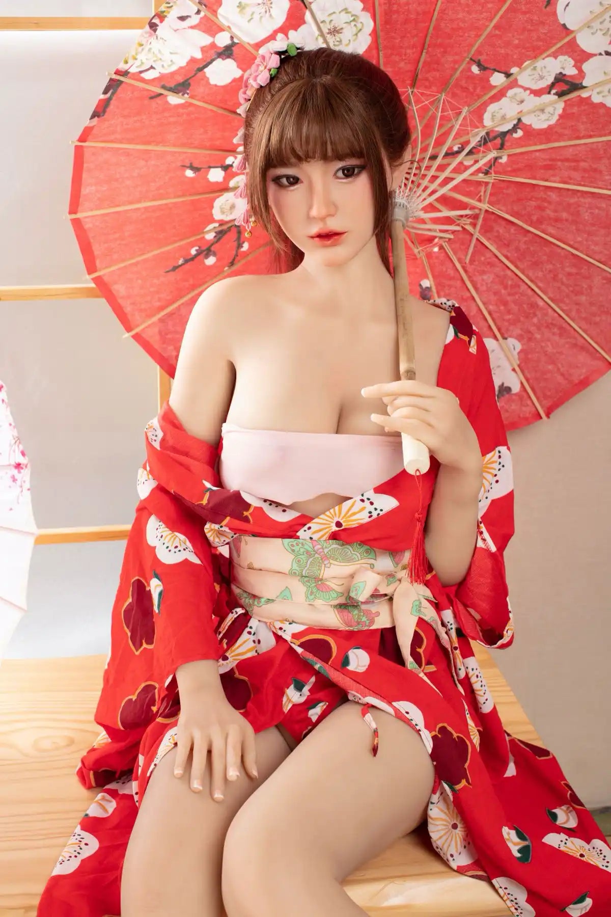 Raina sweet Asian face red floral kimono yukata parted open full figure tatami setting red oil-paper umbrella cherry blossom print, holding a red peach blosom umbrella, in a Japanese tea room – Japanese geisha cosplay sex doll by TopLoveDoll